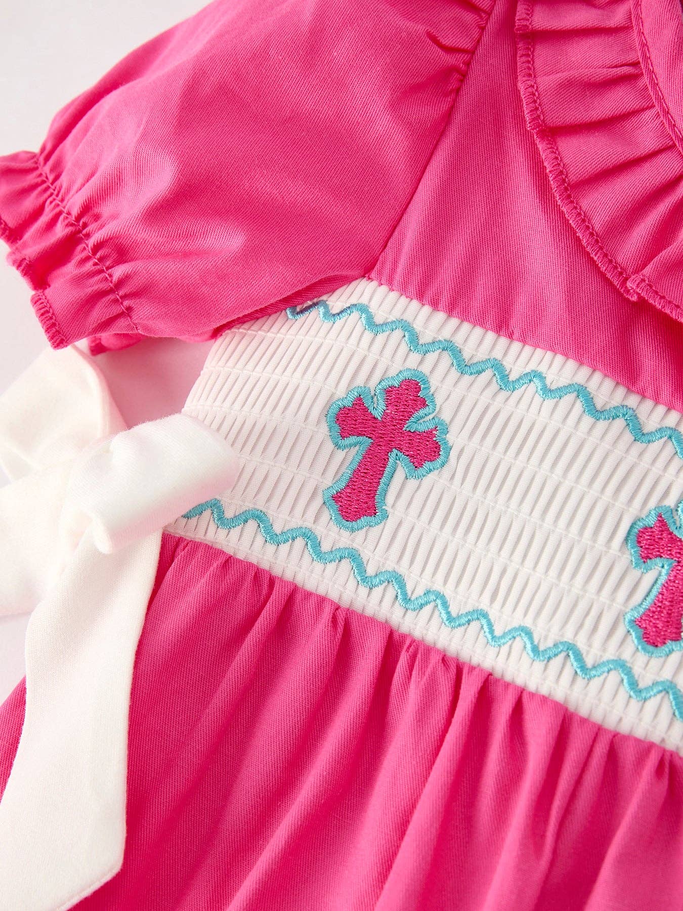 Pink Smocked Cross Romper