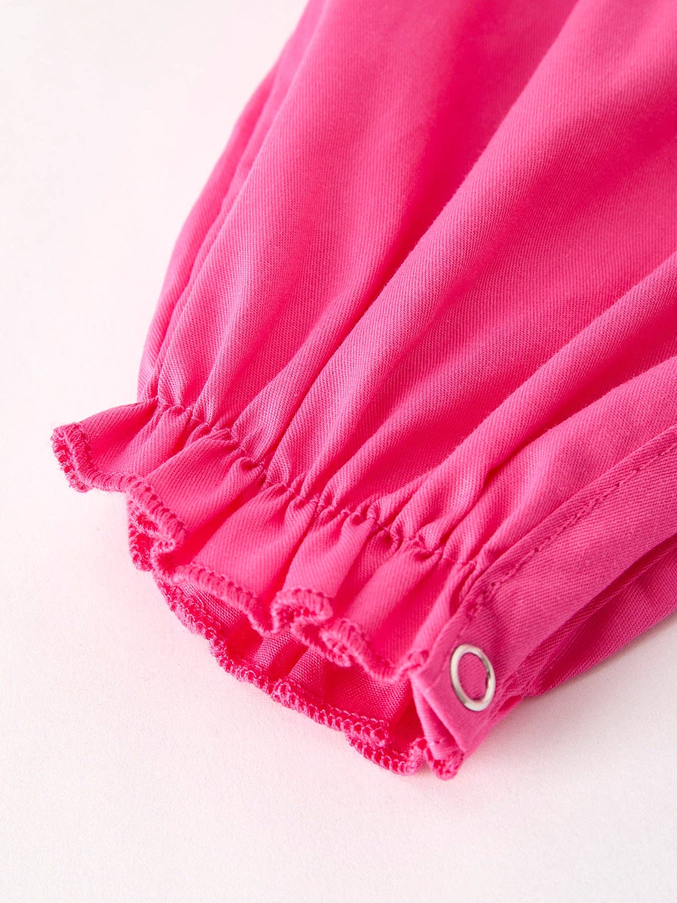 Pink Smocked Cross Romper